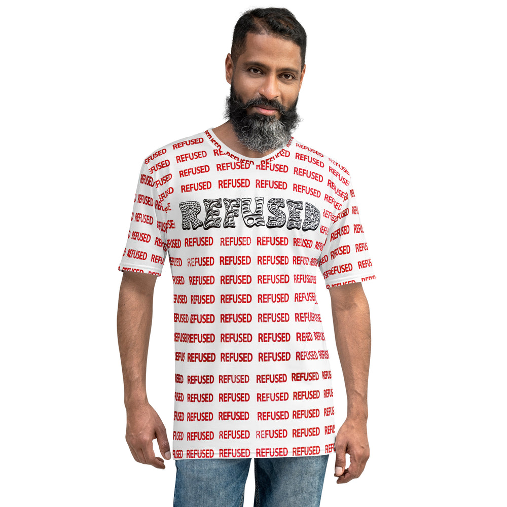 Front view on a male model with a beard wearing Refused Men’s T-Shirt. Regular fit crew neck with bold chest logo of black lettering REFUSED and repeating red “REFUSED” design; styled with jeans to show true-to-size streetwear look. Design by Chicago Optical artist Nicholas Hayes.