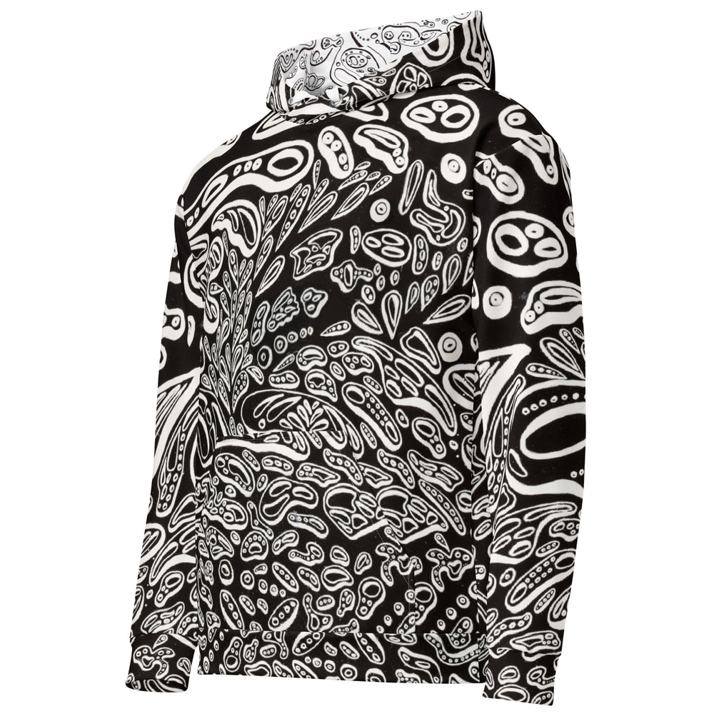 Left-front angled product shot of the a black hooded sweatshirt with white three dimensional shapes showing wraparound abstract artwork, relaxed silhouette, and kangaroo pocket; double-lined hood with printed interior visible at the neckline. Design and Artwork by Nicholas Hayes Art. Wearable abstract art.