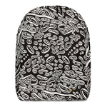 A backpack with a psychedelic black and white geometric pattern, featuring a water-resistant daily carry with multiple roomy compartments. Artwork by Nicholas Hayes.