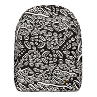 A backpack with a psychedelic black and white geometric pattern, featuring a water-resistant daily carry with multiple roomy compartments. Artwork by Nicholas Hayes.
