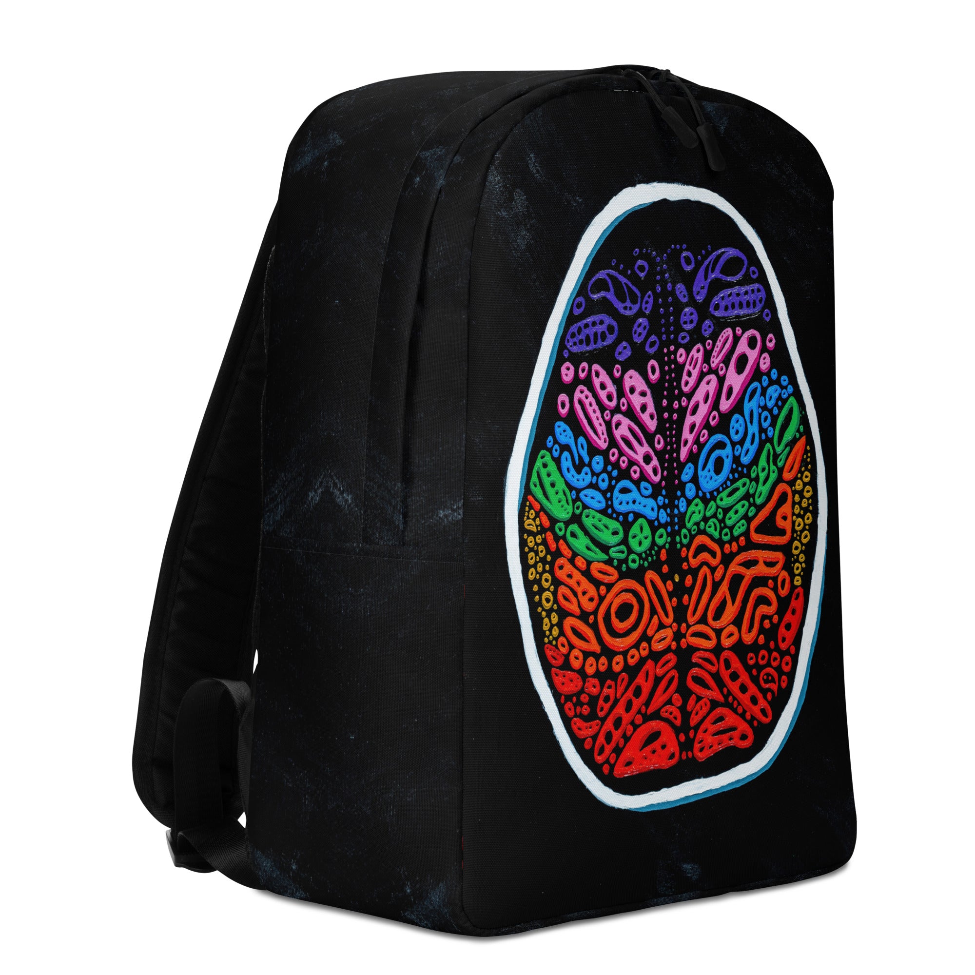 Right-front three-quarter product angle. Clean panel lines, dual-pull top zipper, and vivid Penumbra pattern across the shell for a modern gallery-inspired look on a functional daypack. Design and Artwork by Nicholas Hayes, a Chicago based optical illusion artist. 