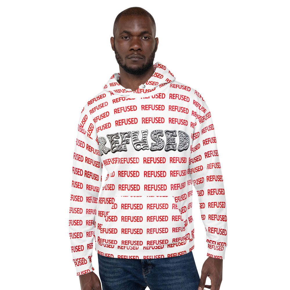 Front view of a black male model wearing the Refused hoodie by Chicago artist Nicholas Hayes. The hoodie it white with red pattern lettering of REFUSED and a black design in the middle of the chest also spelling REFUSED.  Unisex relaxed fit with all-over “REFUSED” print, kangaroo pocket, and drawstring hood; cotton-feel face and brushed-fleece lining for everyday comfort.  A person wearing a white hoodie with the text 'REFUSED' printed in red and black on the hoodie's surface.