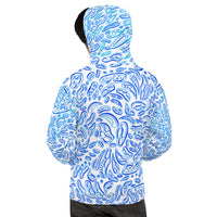 the backside of a man wearing a blue and white colored hooded sweatshirt for women.  The shapes are big and small and are light blue and dark blue.  Ocean camouflage design. ocean optical illusion art. Nicholas Hayes painter.  Optical art artist. 