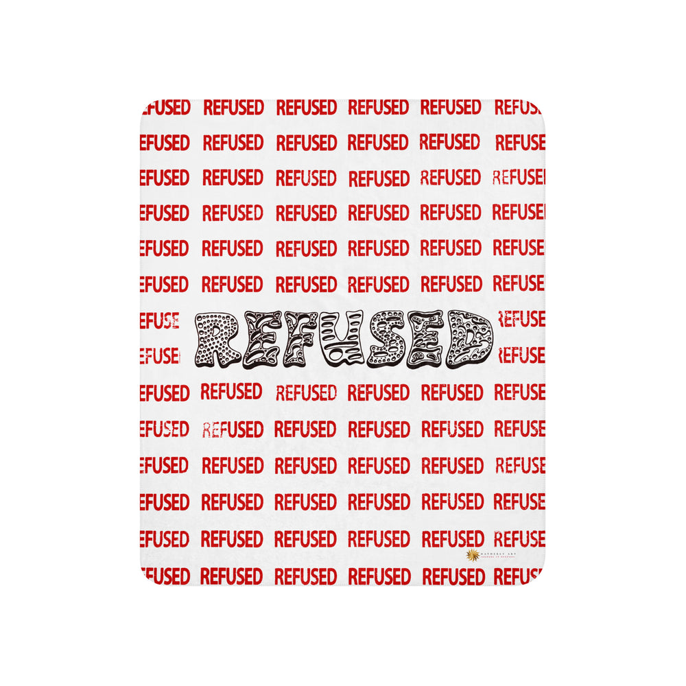 A blanket with the word 'REFUSED' written in capital letters, surrounded by a red border. Flat product view of the Refused sherpa blanket by Chicago artist Nicholas Hayes. white front with repeating red “REFUSED” pattern and oversized black wordmark of REFUSED, rounded corners; contemporary graphic throw for couch or bed.