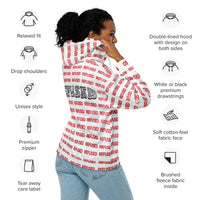 a woman model wearing a white hoodie with red letters spelling refused.  there is also a black refused word taking up the midback section.  There are details describing the product; relaxed fit; drop shoulders; unisex style; premium zipper; tear away care label; double-lined hood with design on both sides; white or black premium drawstrings; soft cotton-feel fabric face; brushed fleece fabric inside. the design is by optical artist Nicholas Hayes