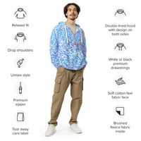 a man wearing a zip hoodie of an octopus.  the hoodie is made of colorful shapes of blue and white for water.  the octopus is black, red, and orange. there are words that describe the hoodie - relaxed fit, drop shoulders, unisex style, premium zipper, tear away care label, double-lined hood with design on both sides, white or black premium drawstrings, soft cotton-feel fabric face, brushed fleece fabric inside.