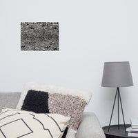 Secondary wall mockup of psychedelic art by emerging Chicago-based artist Nicholas Hayes. 12×16 fine art print above a couch.  Minimalist trippy black and white abstract design centered on a clean wall, highlighting its striking graphic impact for modern interiors.
