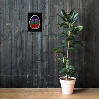 A fine art print poster featuring a colorful abstract design, displayed on a wall above a potted plant. Wall mockup of ‘Penumbra Painting No. 2’ fine art print by Chicago artist Nicholas Hayes. 12×16 museum-quality matte paper; rainbow abstract brain motif on black field, shown as a modern focal point above a wood floor and plant.