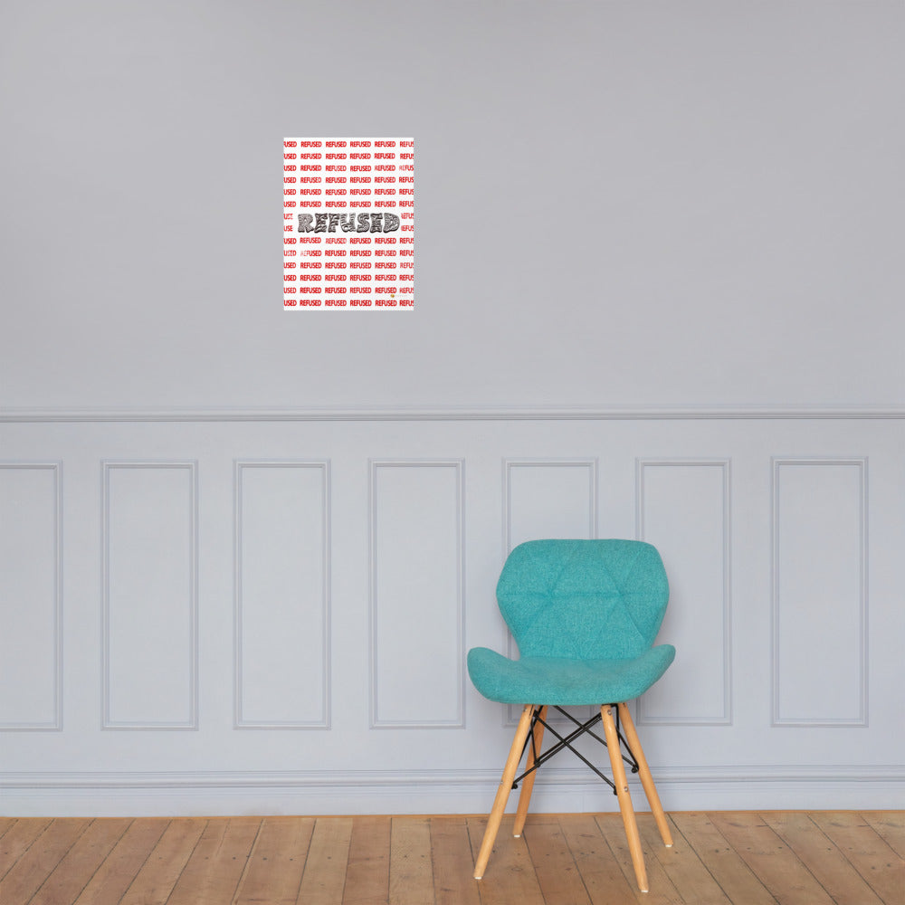 ‘Refused’ 12x16 fine art print hanging on a neutral wall. Large black REFUSED wordmark over red pattern shown as a bold graphic centerpiece for minimalist, industrial, or modern home décor. There is a Tiffany blue chair to the right of the fine art print. Artwork by Nicholas Hayes.