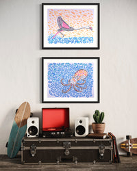 two paintings hung directly above each other by artist Nicholas Hayes. one painting is of a flamingo.  The other painting is of an Octopus in the Optical illusion art style, op art. blue and pink and yellow shapes.